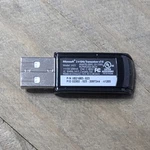 Microsoft 2.4GHZ Black Dongle Transceiver V7.0 Model 1423 Oem Genuine Used. Price: $11.99.