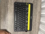 Logitech K480 Compact Bluetooth Wireless Keyboard, Black/yellow, English Qwerty Used. Price: $7.00.