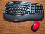 Logitech Wave Ergonomic Keyboard Wireless K350 With K310 Mouse. Dongle Used. Price: $39.95.