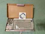 ACK-580 One Touch Simply Wireless Multimedia Keyboard Trackball Retro Tech Open. Price: $29.00.