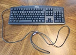 Dell Black Keyboard Model SK-8110 With Purple (PS/2) Plug Wired CN-07N242 Used. Price: $6.00.
