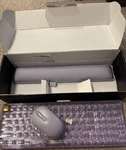 Ubotie Transparent Purple Wireless Qwerty Keyboard & Mouse Bundle Open. Price: $30.00.