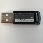 Microsoft 1423 - 2.4GHZ Transceiver V7.0 Wireless Usb Dongle Used. Price: $18.00.