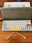 Nuphy AIR60 V2 Wireless Mechanical Moss Switches Tactile With Folio And Box Open. Price: $110.00.