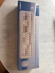 X9 Wireless Keyboard & Mouse Combo Cute Colorful Typewriter Set (brown) Open. Price: $20.00.